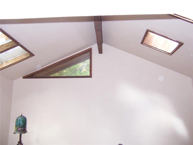 Vaulted Ceilings in many upstairs rooms