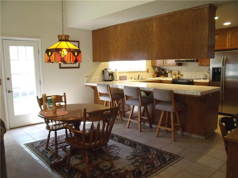 Breakfast nook & bar, French Doors to yard