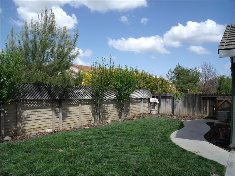 Nicely landscaped front & rear