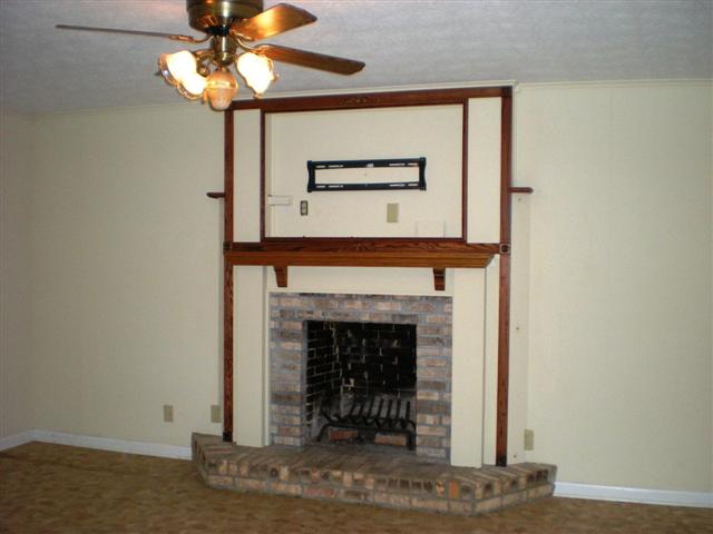 Brick Fireplace with mantle, ready for TV