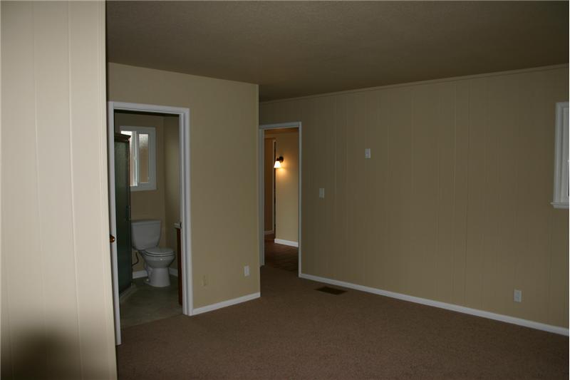 Separate South Wing master suite with full bathroom and possible 5th bedroom or auxillary room