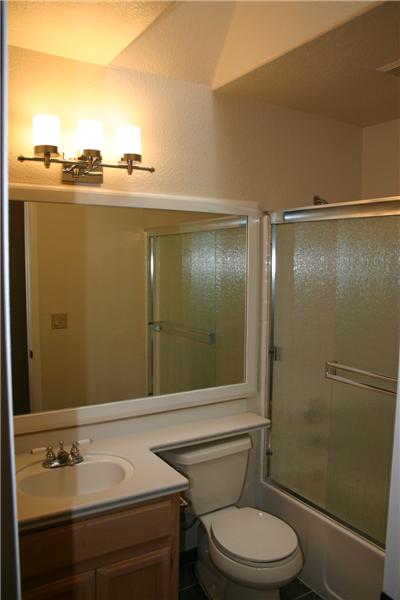 Newly Glazed Tub/Shower Enclosures in Both Baths