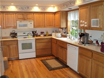 spacious kitchen with recessed lighting