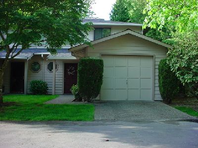 Wonderful end unit with attached garage