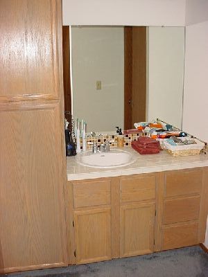 Master Vanity with linen closet and 2 clothes closets.