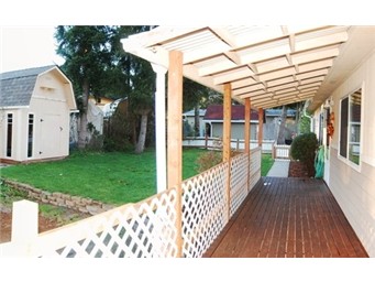 another view of deck and yard