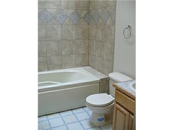 bath with jetted tub