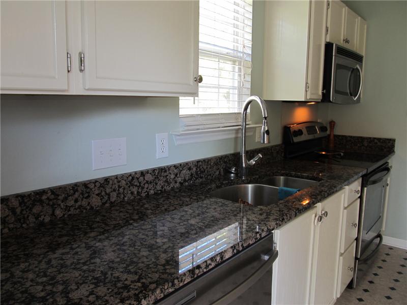 Updated with stainless appliances and granite counter tops