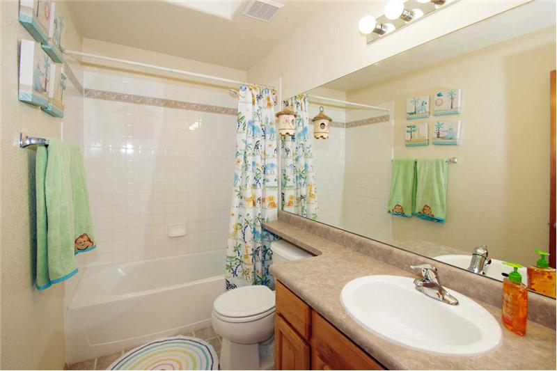 Full upper level bath with skylight