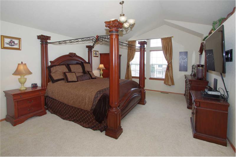 Spacious master bedroom with vaulted ceilings