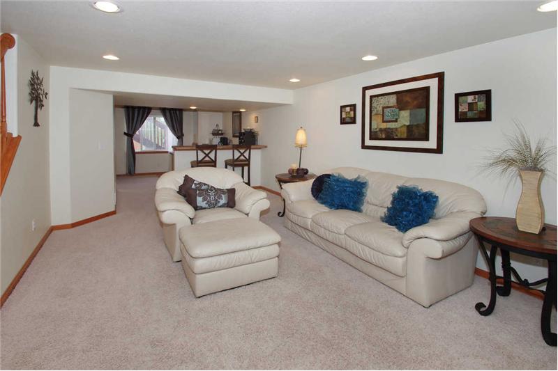 Professionally finished basement! Rec room with recessed lighting