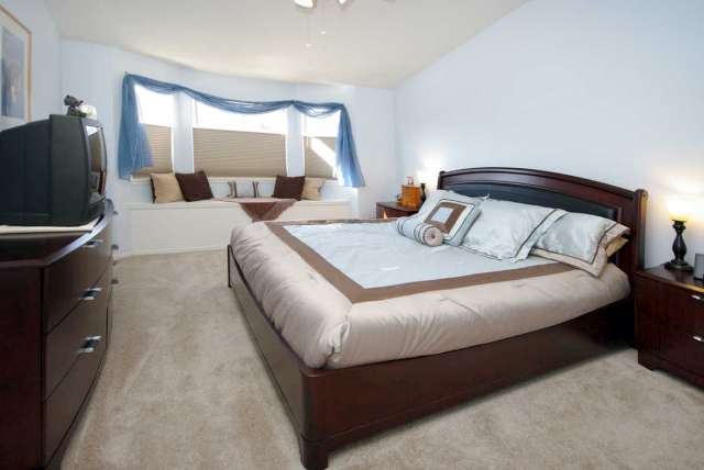 Master bedroom with window seat storage
