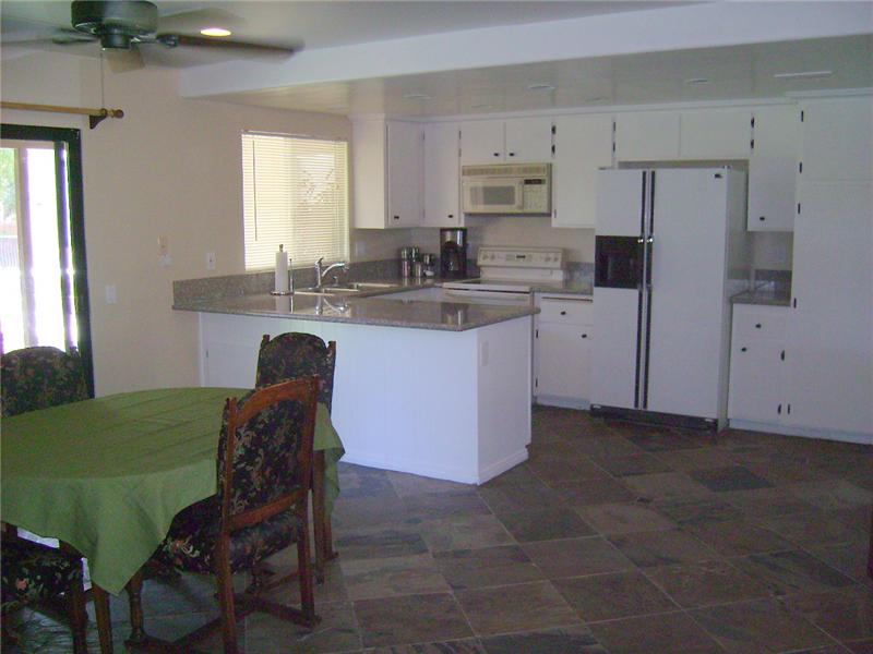 Slate Floors From Dining Into Kitchen