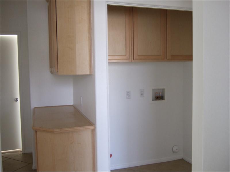 Laundry Area In Hallway