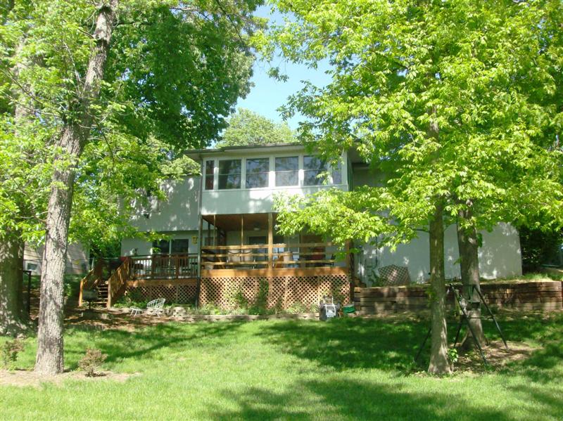 Back of house with leaves