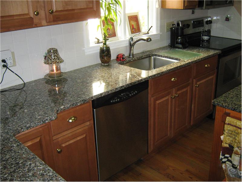 Remodeled Kitchen with granite tops