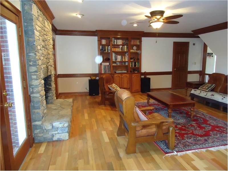 New Bella hardwood oak floors in living room. W.C door on far right.