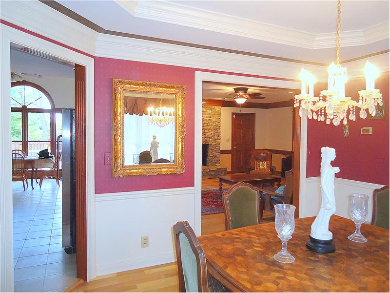 Dining Room leads to Living Room and Kitchen