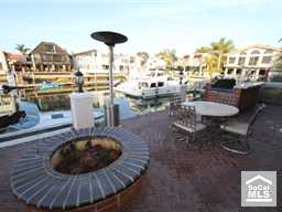 Sit by your fireplace on your waterfront deck