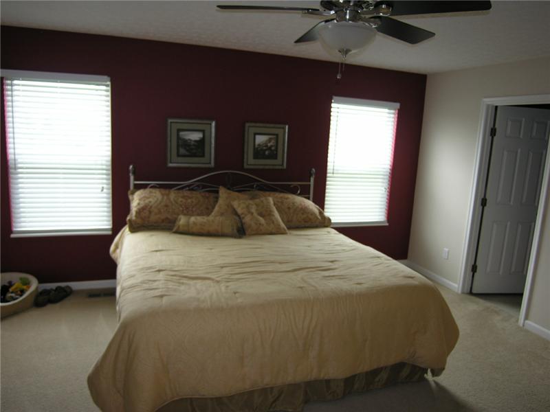 wall to wall carpet, bath adjoins, walk in closet
