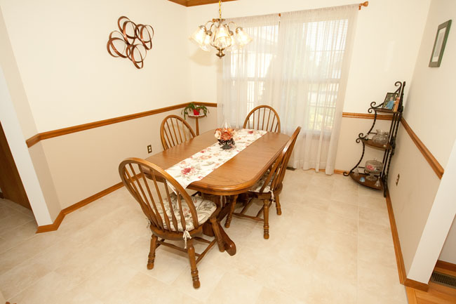 Dining Room w/ chandelier, chair rail