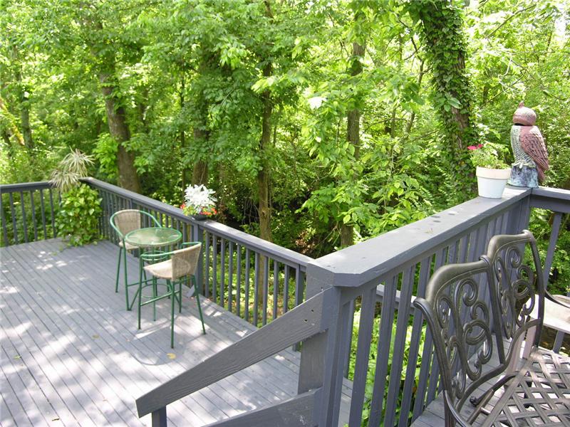 Beautiful back deck that sits on a wooded lot