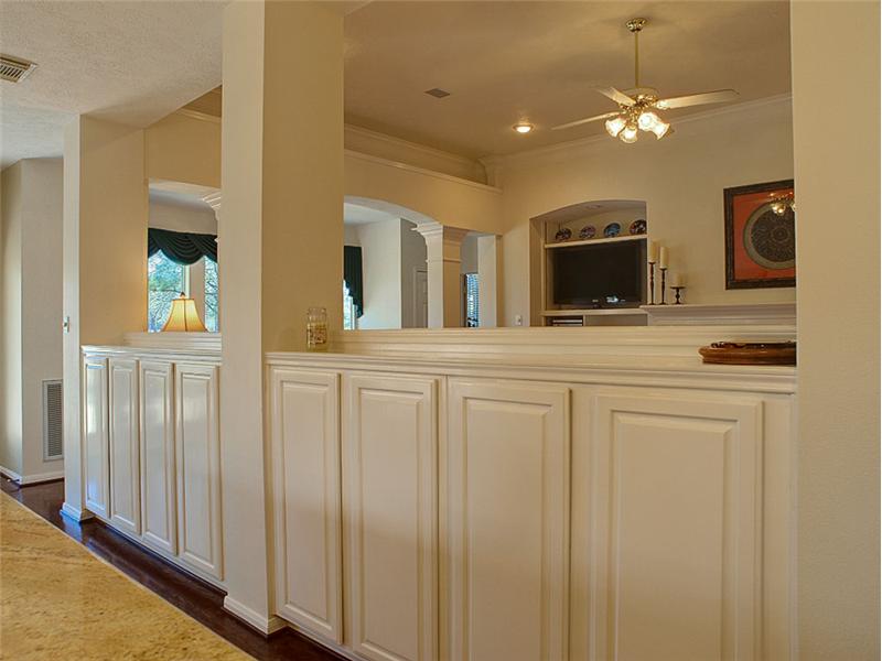 The half wall that separates the kitchen from the dean is fantastic storage!
