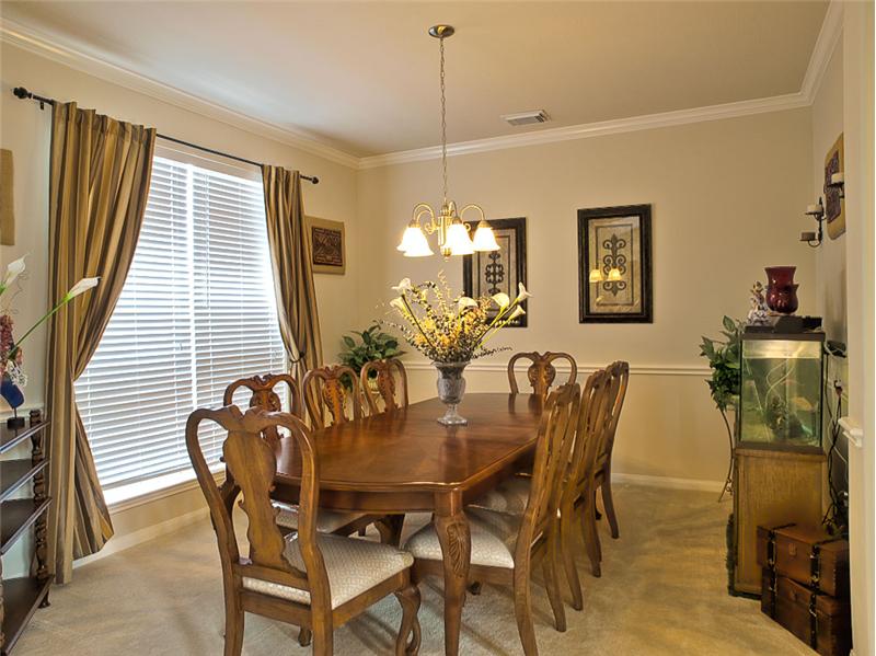 Formal Dining has a Chair Rail & Crown Molding.