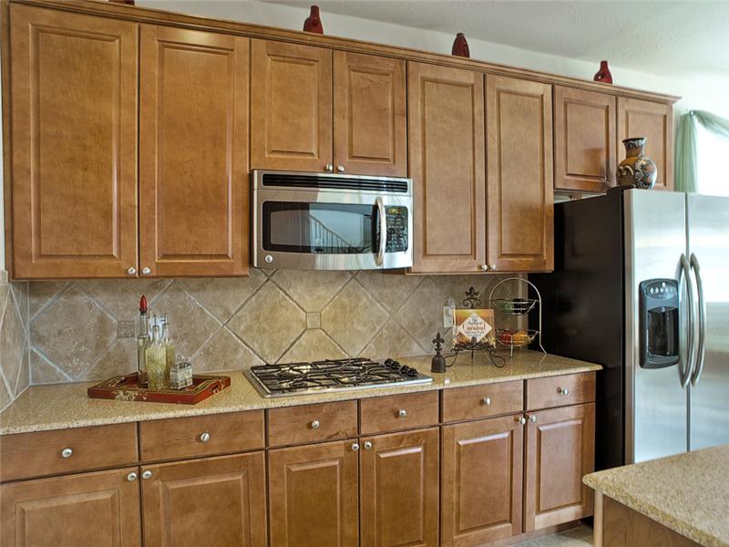The chef-friendly kitchen has lots of cabinet space.