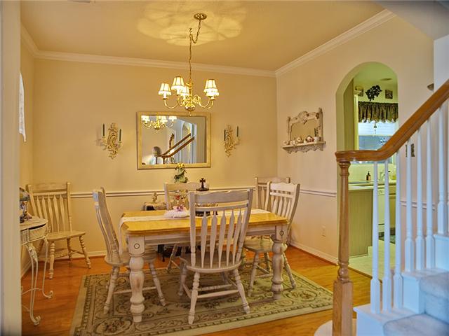 The formal dining room has a chair rail & crown molding.
