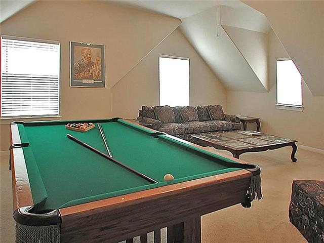 The game room has plenty of space for activities.