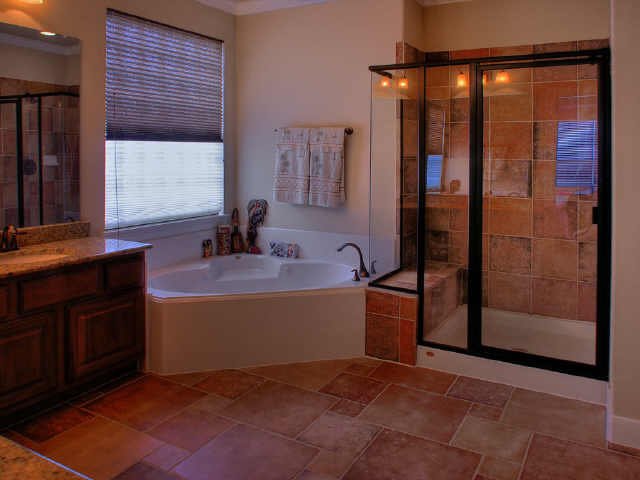 The Master Bath with separate tub & shower.