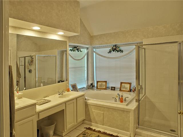 The Master Bath has separate tub & shower.