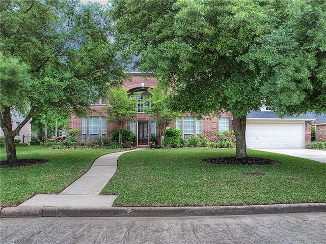 Wooded lot adds curb appeal.