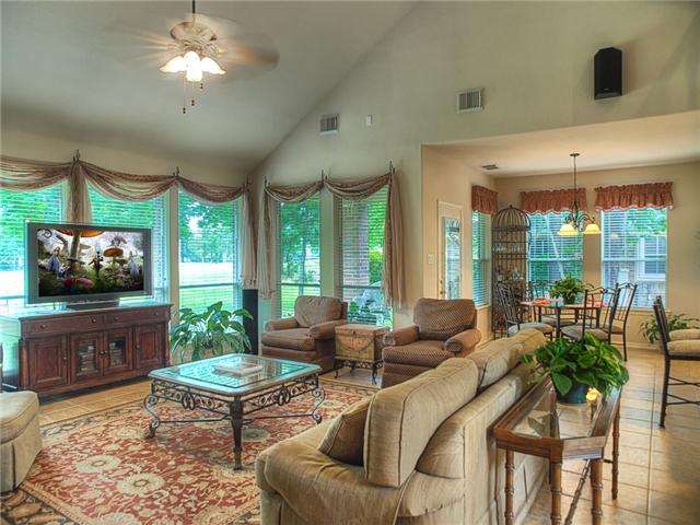 The den has a wall of windows with an amazing view!