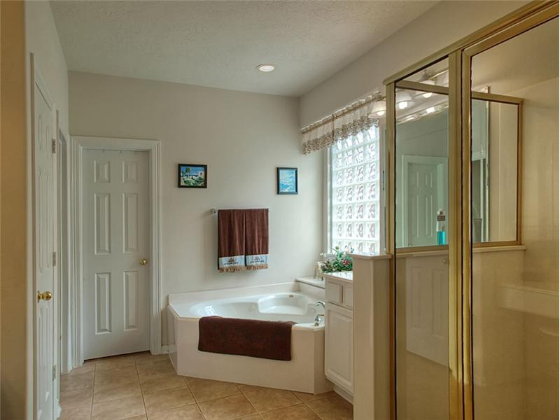 The Master Bath has separate tub & shower.