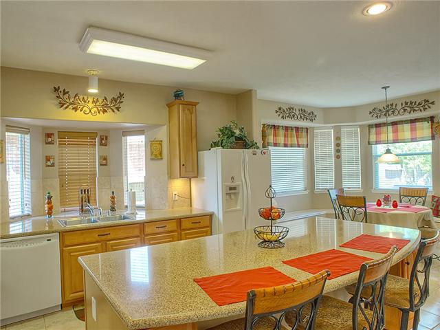 The kitchen has plenty of counter & cabinet space.