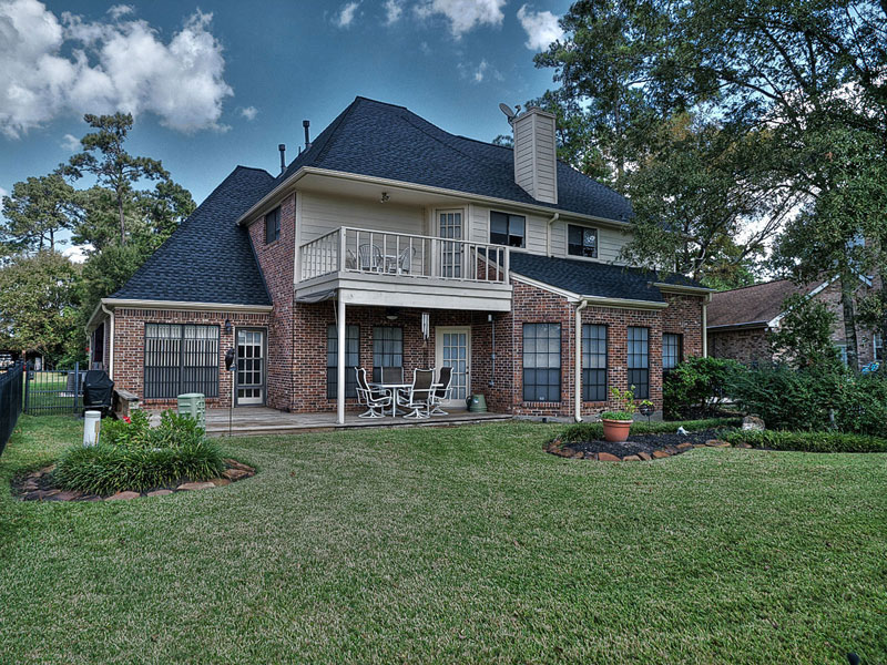 A view from the golf course of the home.