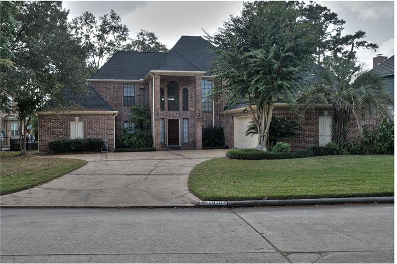 Great curb appeal draws you to this custom built home.