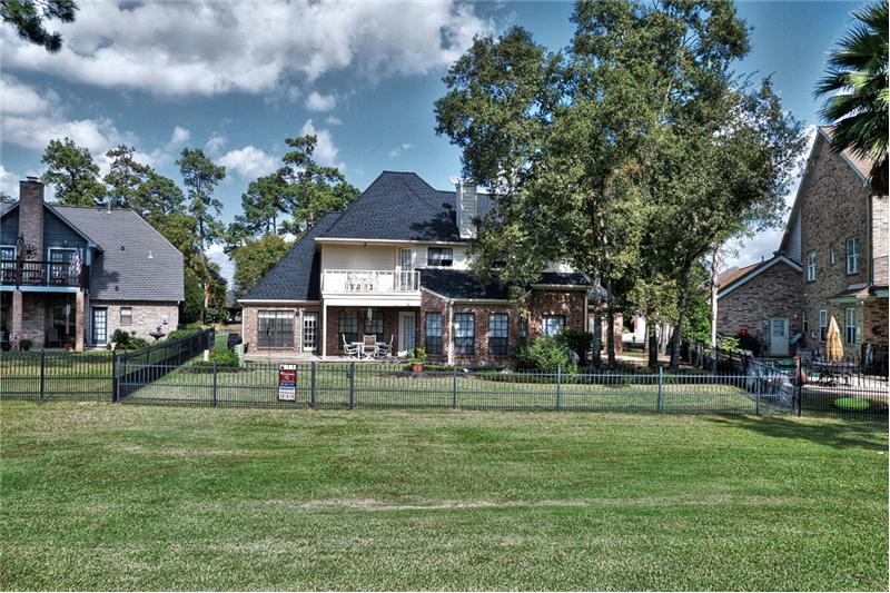 Another view of the property from the 7th hole at Walden on Lake Houston.