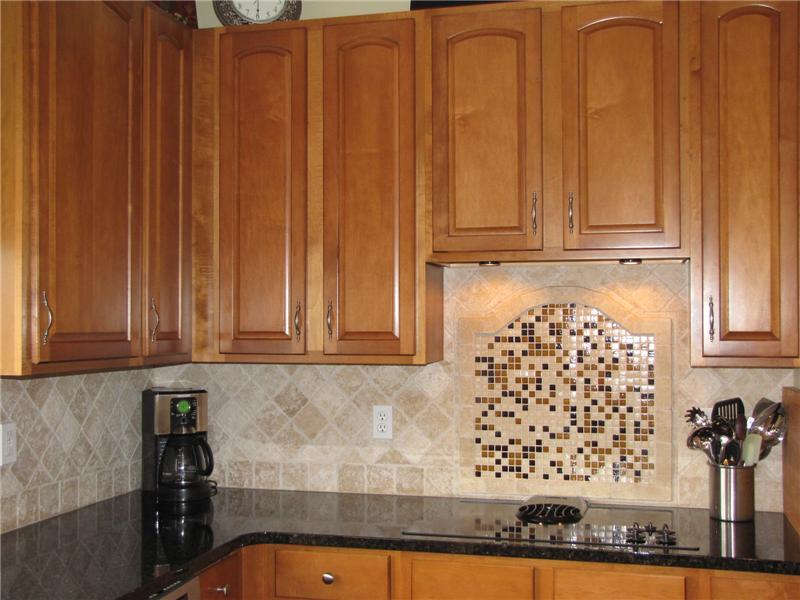 Tumbled  Tile Back splash, 42in Maple Cabinets