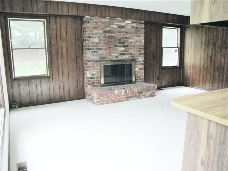 Family room With wood Burning fireplace