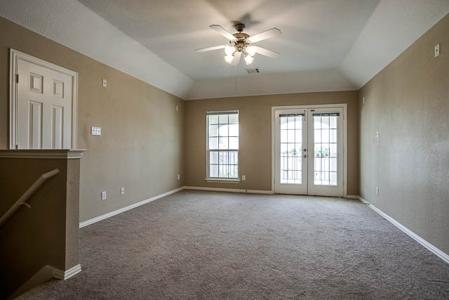 A gameroom is located upstairs. Perfect for a playroom, office, or second living area!
