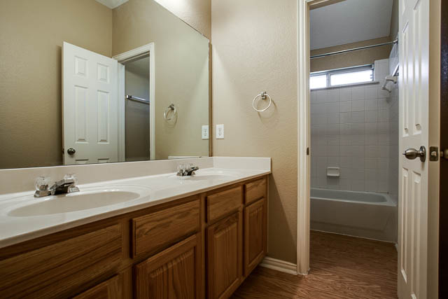 The home offers two full baths and one half bath.