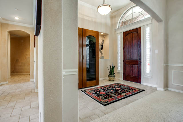 Walk into your dream home! Notice the tall doors and crown molding.