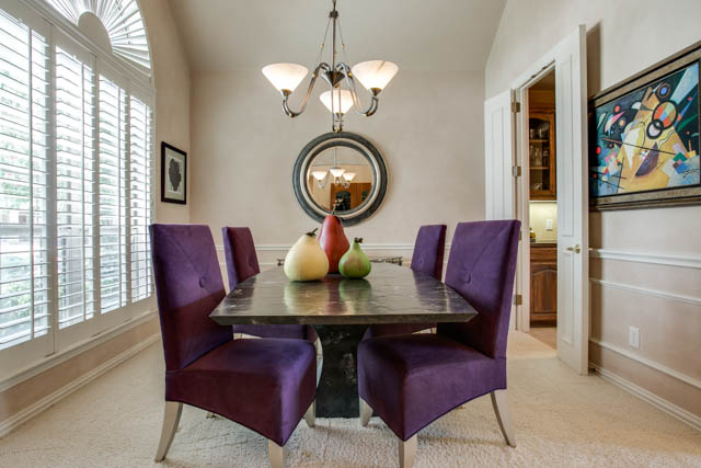 Enjoy fine dining in the formal dining area. Take note of the decorative lighting.