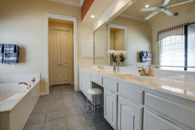 Jack & Jill style bath with dual sinks and a walk-in closet!