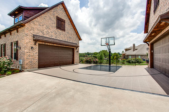 The home features a 4 car garage with 2 detached.