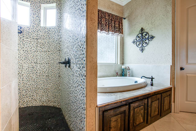 The attached master bath gives you the perfect place to unwind - a jetted tub!