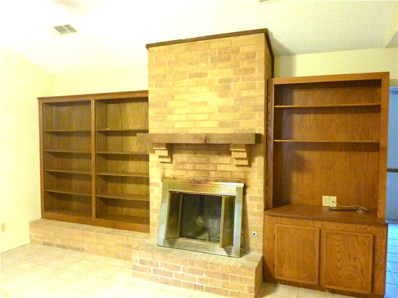 This home has lots of built-ins. Cozy up next to the fireplace in the wintertime.